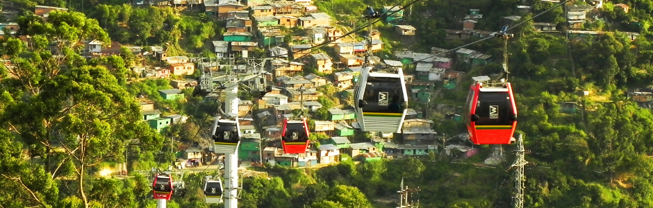 The Metrocable system in Medellín has cable cars above houses and tropical forest